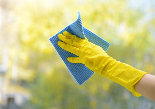 Professional window cleaning for a Canary Wharf apartment building exterior