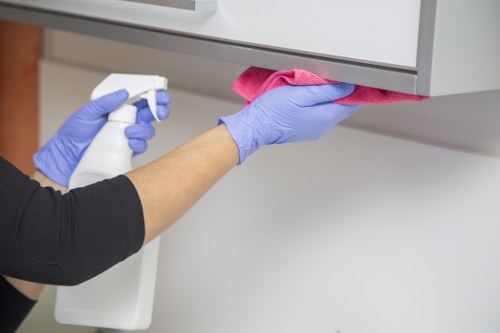 Detailed post-construction cleaning of kitchen surfaces and fittings